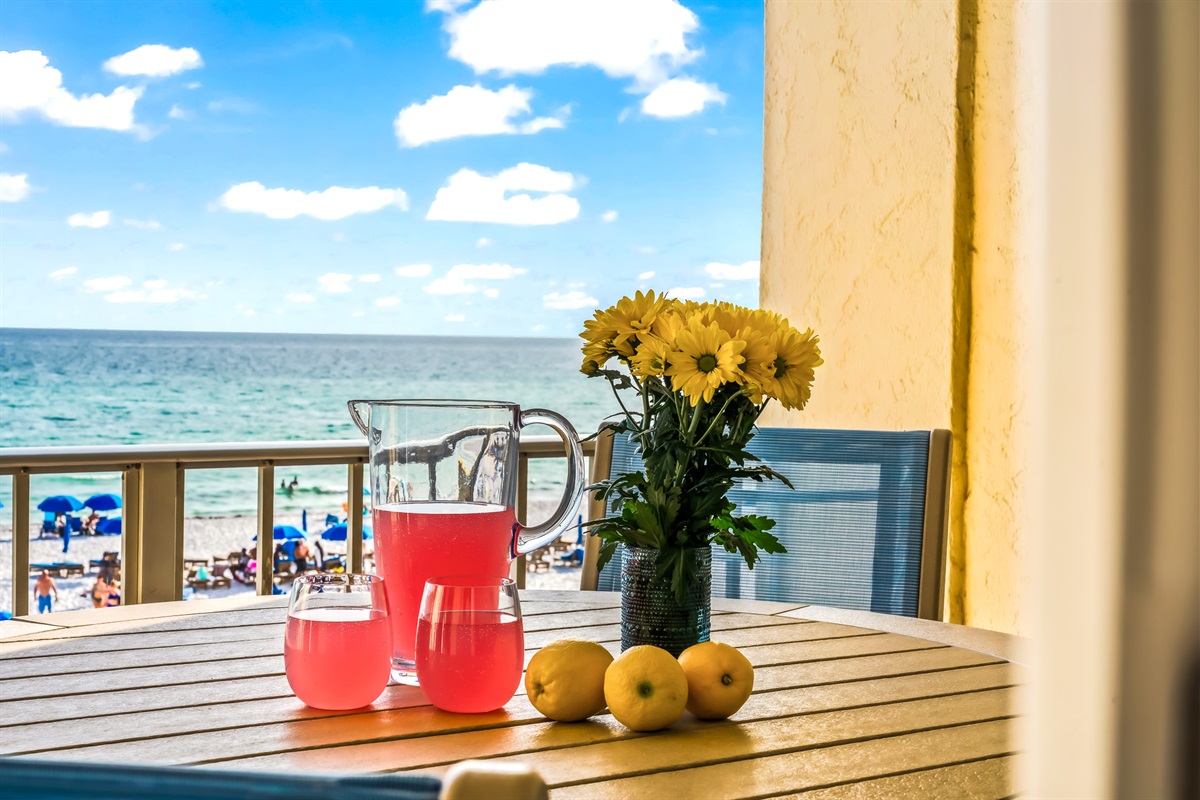 Sip something cold on your private balcony by the sea.