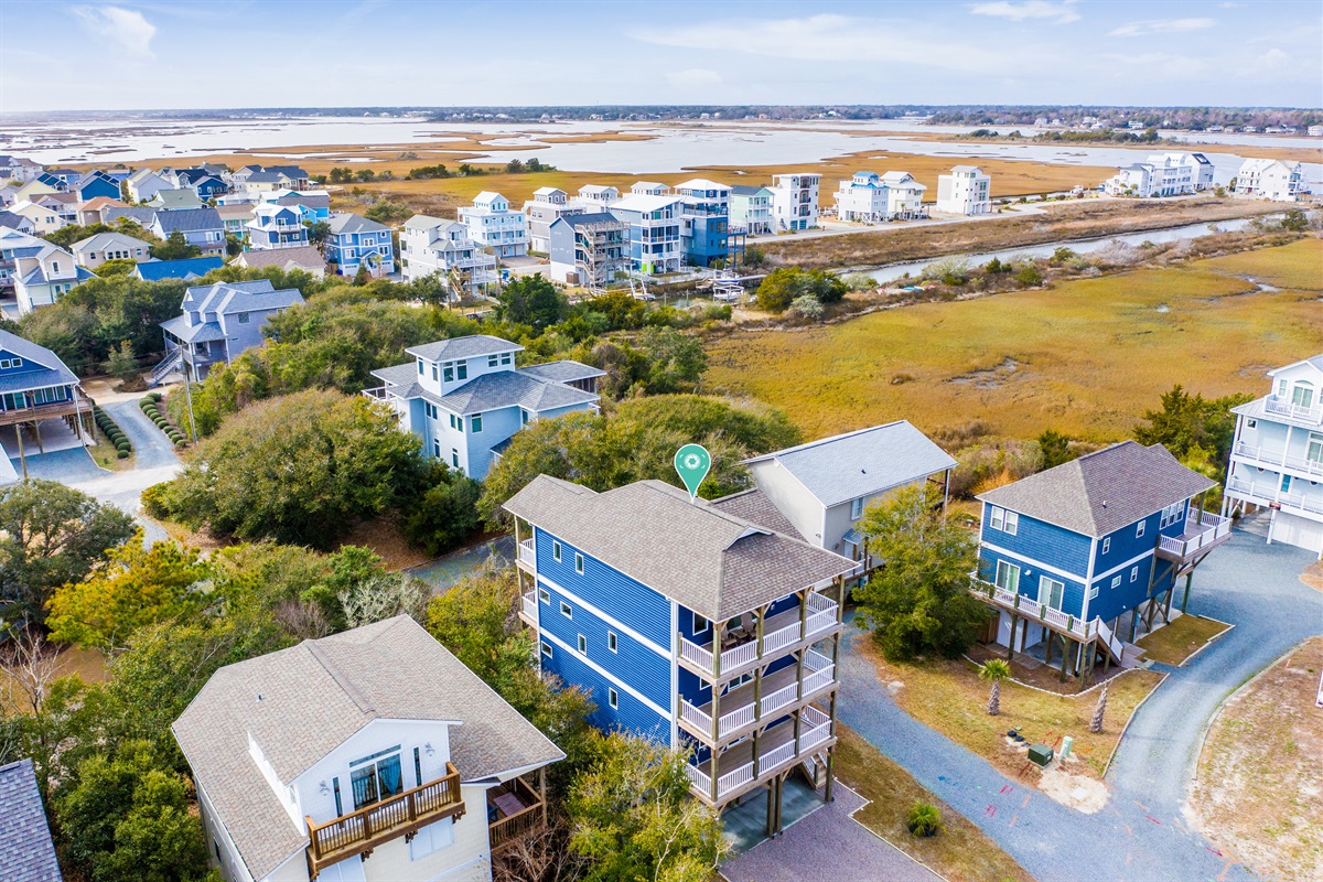 Nestled at the end of a quiet street with the Intracoastal Waterway as its stunning backdrop, this home offers peace, privacy, and unbeatable coastal views