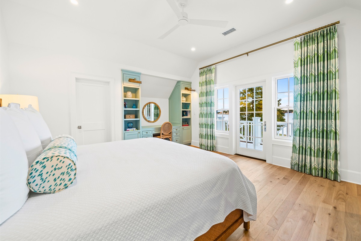 Bright guest room with soft color tones and airy feel.