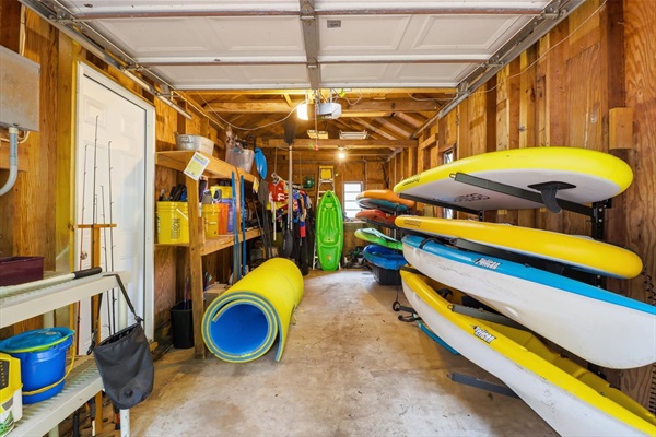 Boathouse with kayaks, paddle boards, fishing gear, wetsuits, liily pad & life jackets