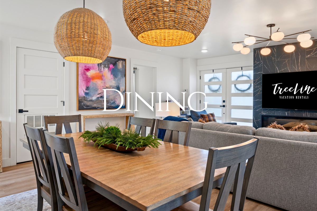 The dining area feels bright and open, offering a comfortable spot to gather for meals, games, or long conversations around the table.
