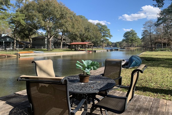 Lakeside dock and wrought iron table and chairs.