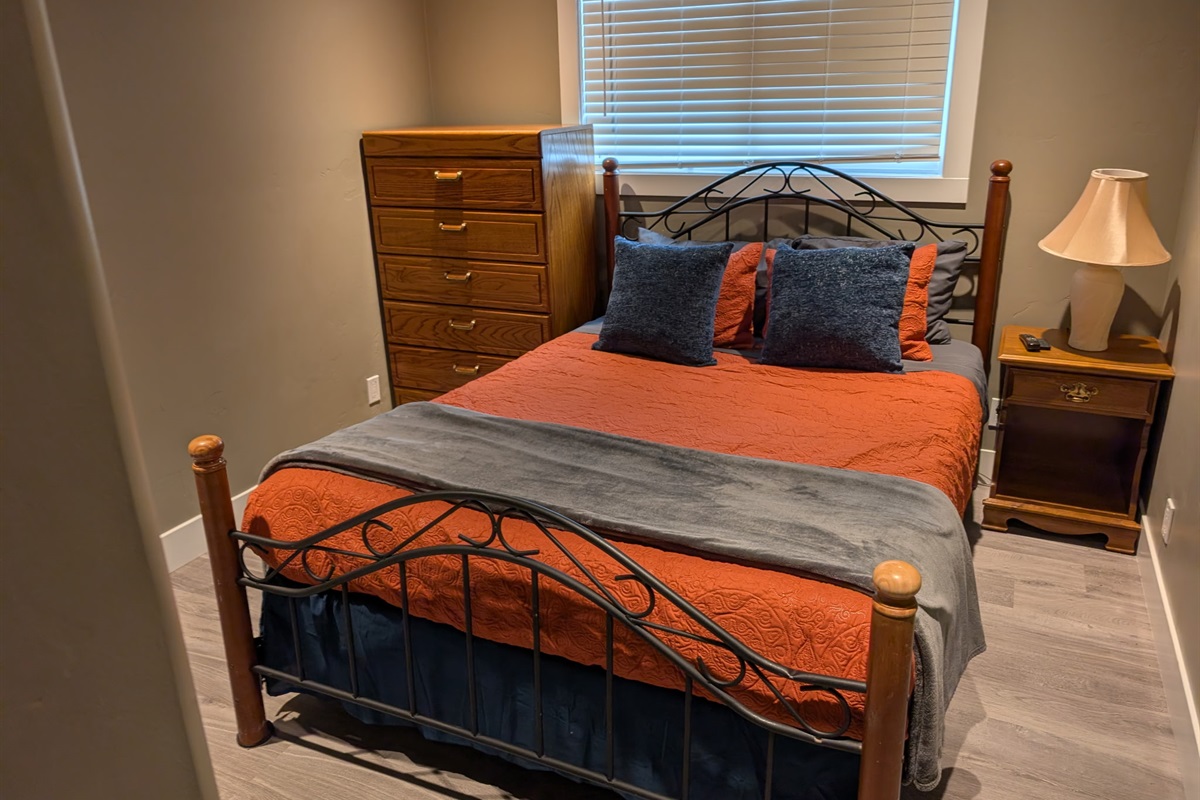 Bedroom #2 has a nice queen size bed with a smart tv