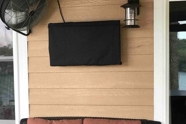 Outdoor TV allows you to watch Netflix, Hulu, Amazon Prime, as well as other internet television apps. Fan keeps air moving and the bugs away to enjoy the outdoor seating areas. 