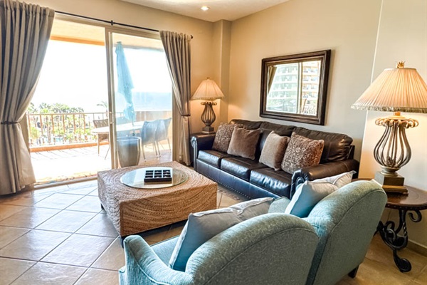 Relaxing living room with patio access and Sea of Cortez views.