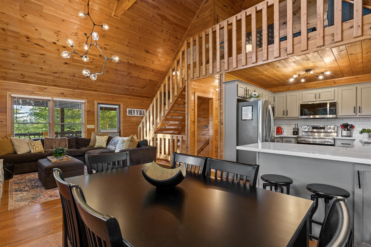 The heart of the home, where meals and moments are shared beneath vaulted wooden ceilings.