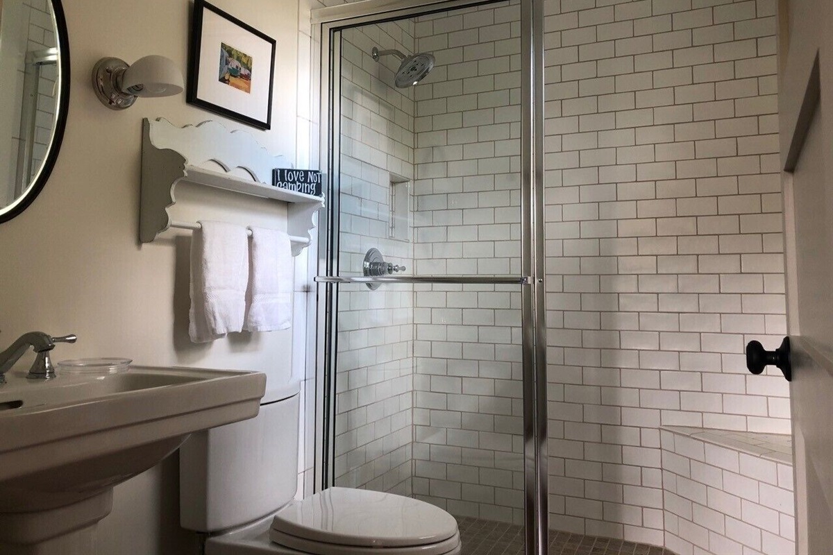 Bathroom located next to the loft bedroom. Shower has a rain shower head