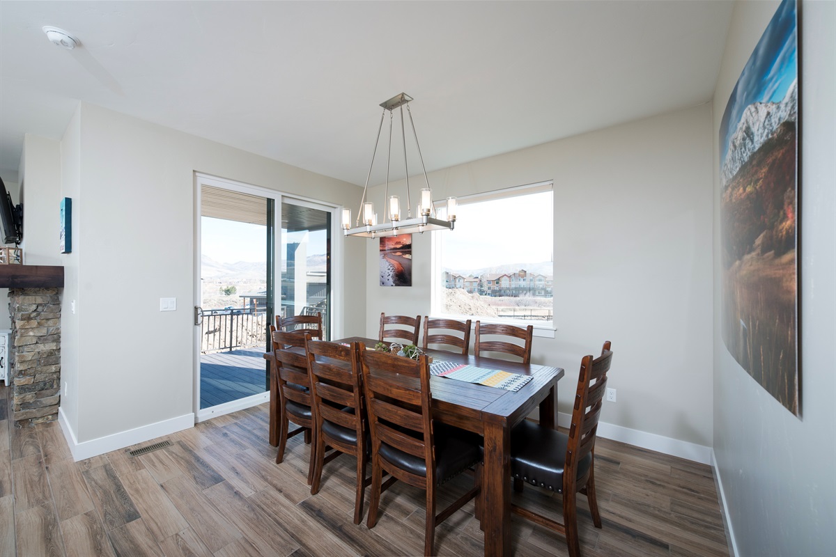 Sunlit dining area with scenic views in every direction