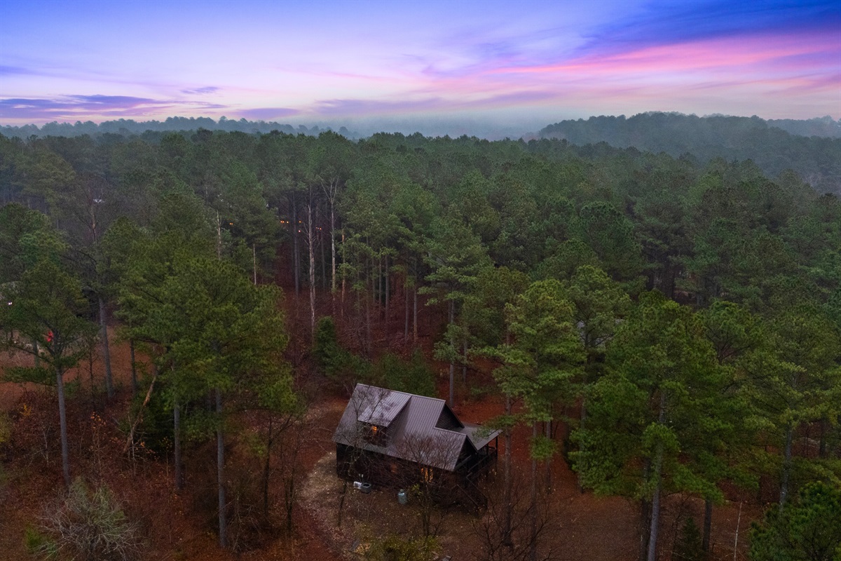 A scenic aerial view captures the calm, wooded beauty that makes Broken Bow such a relaxing getaway.