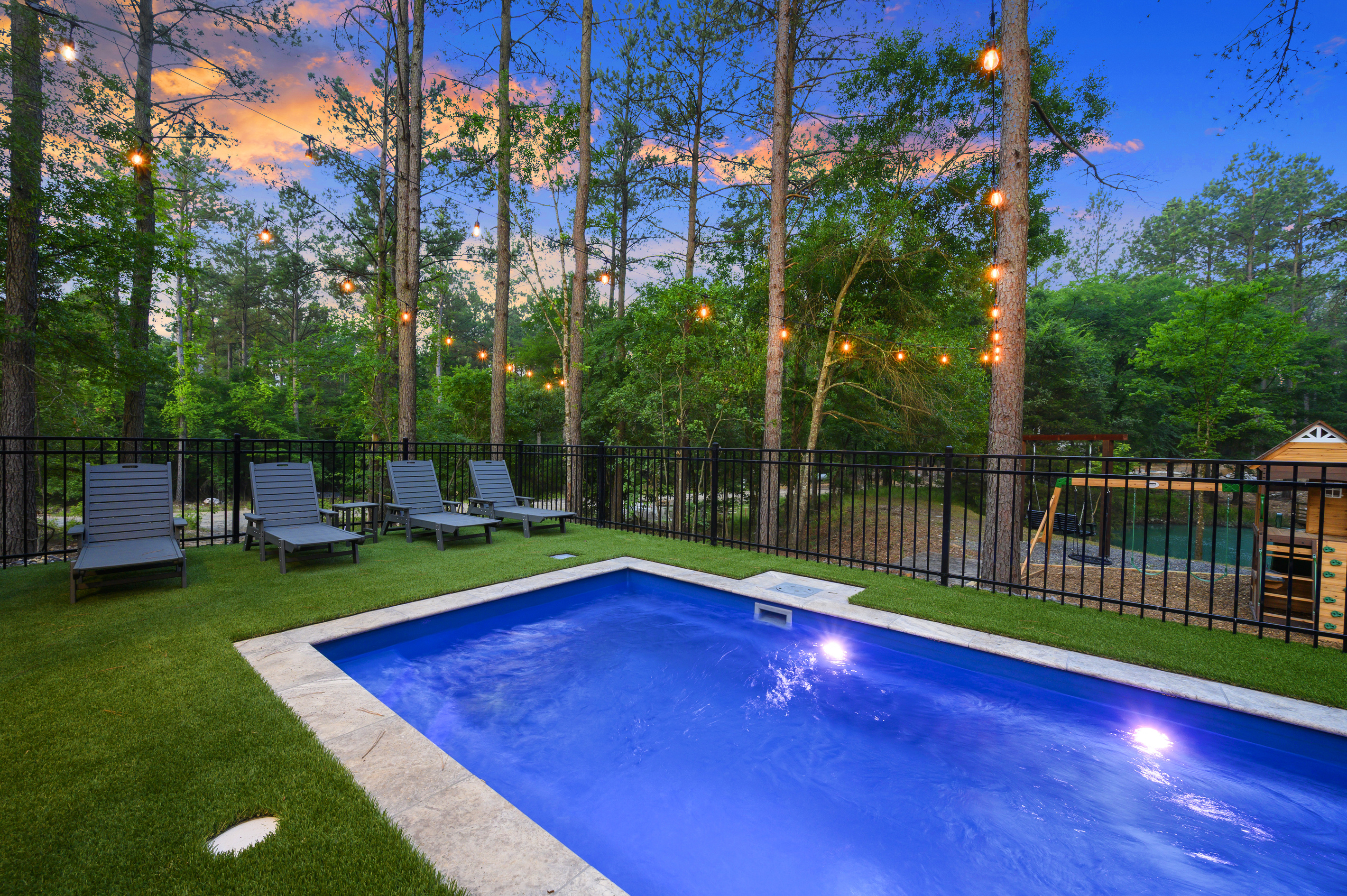 Pool days feel different under the pines. Swim, lounge poolside & let the kids play nearby, then stay for golden hour as the lights come on and sunset glows through the trees.