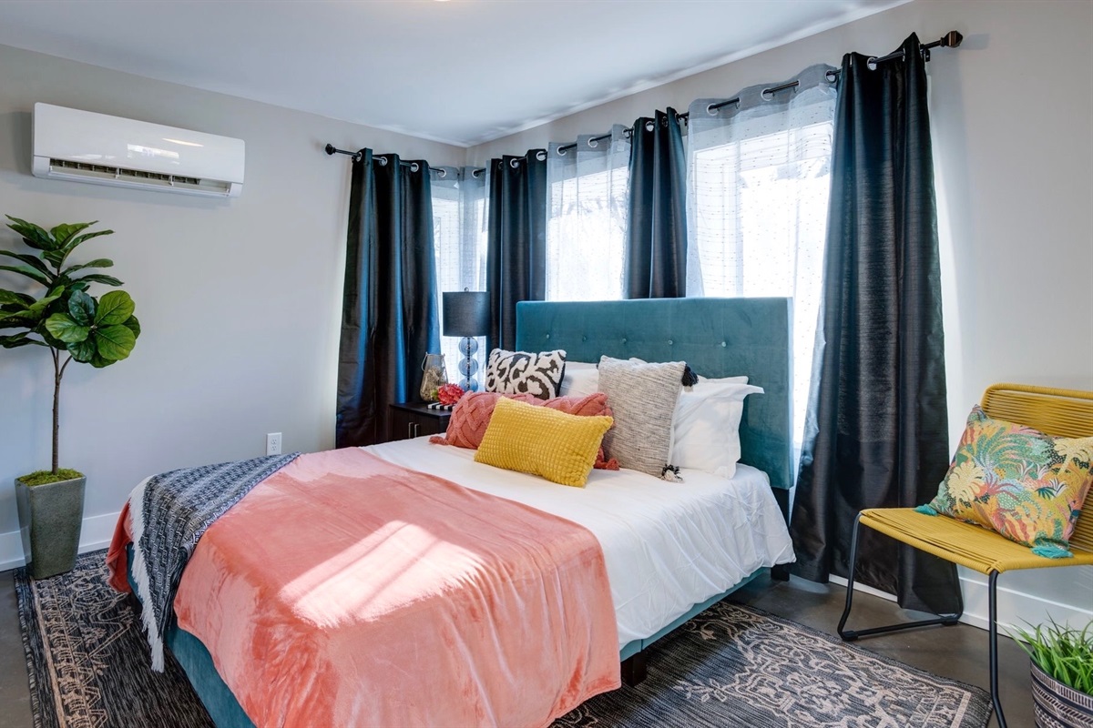 - Let the sunshine in, this airy bedroom is full of charm and cheerful vibes - Coral, teal, and mustard accents make the space pop with personality - Sleep easy with blackout curtains, cozy layers, and a quiet, peaceful vibe  