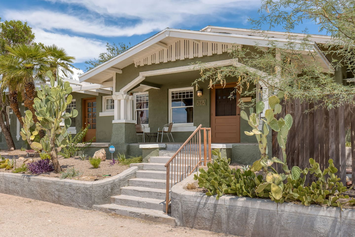 private front porch with seating and sunset views