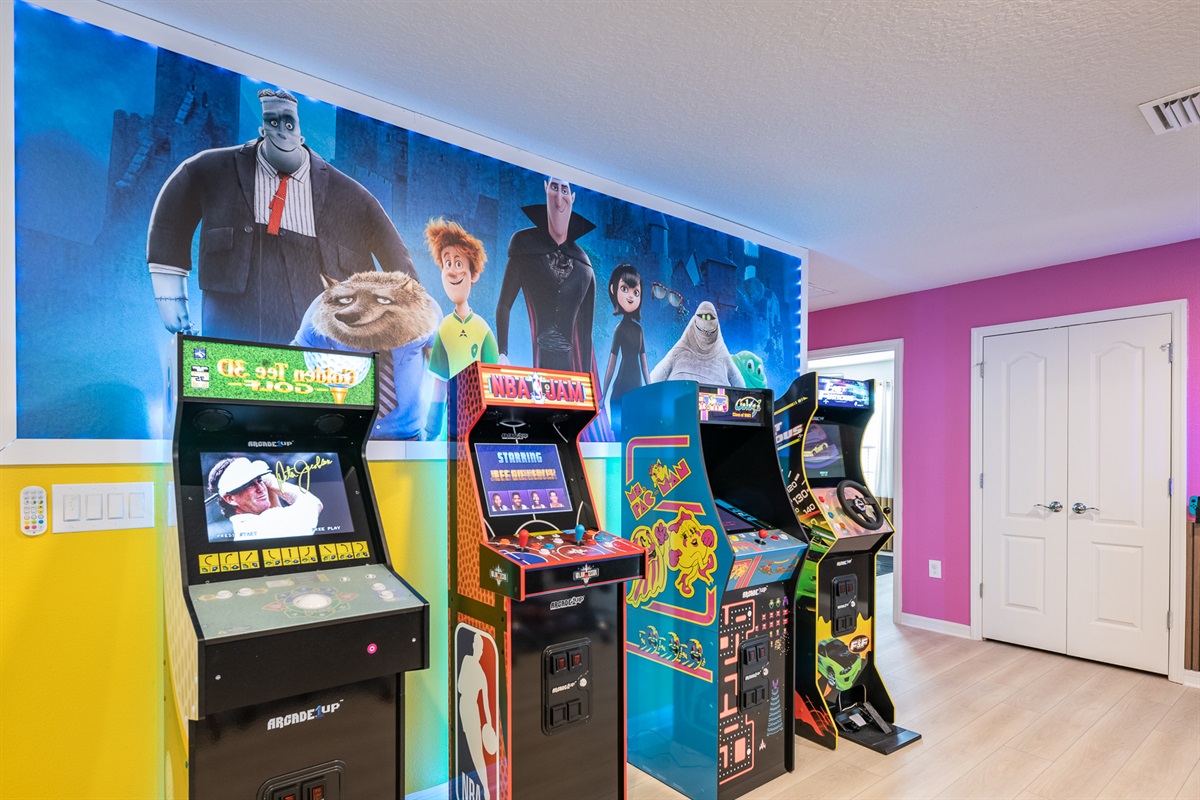 Four Full Sized arcade games with Golden Tee Golf, NBA Basketball, Pacman with Galaga and Fast & Furious driving game.