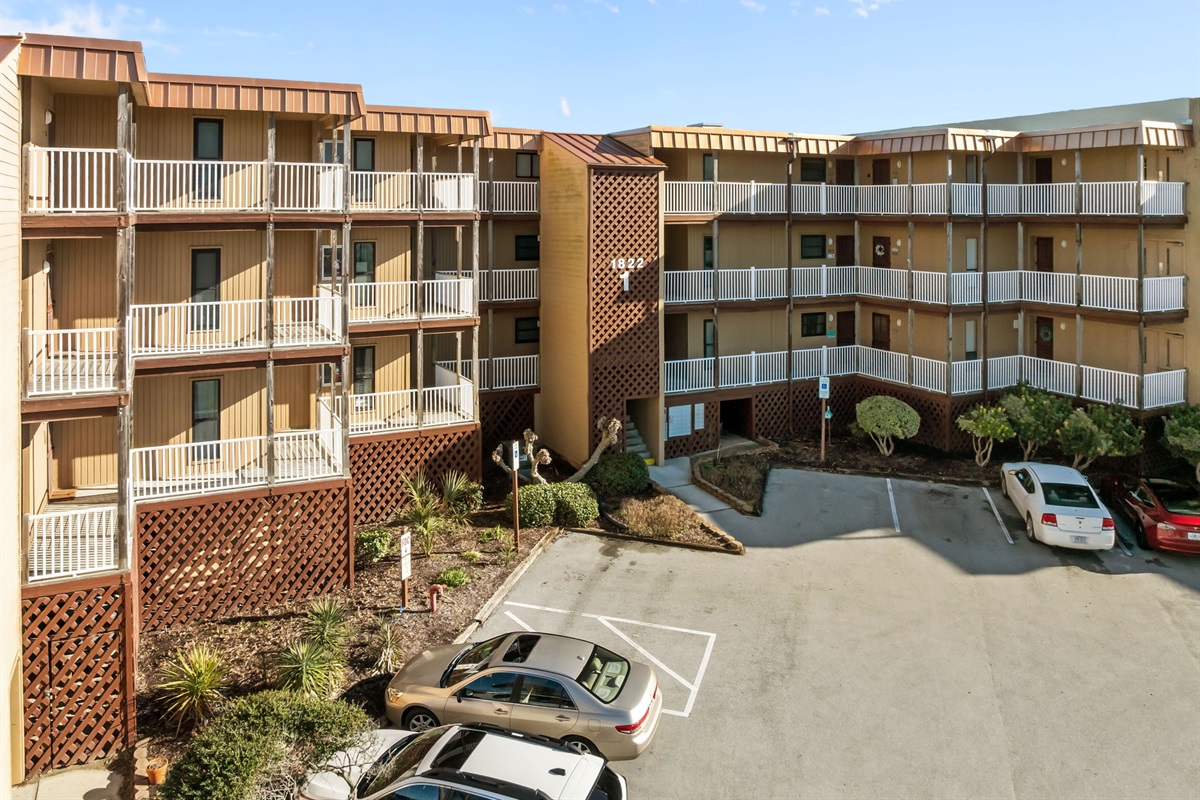 Guests will find convenient on-site parking with easy access to the main entrance of Topsail Dunes Building 1
