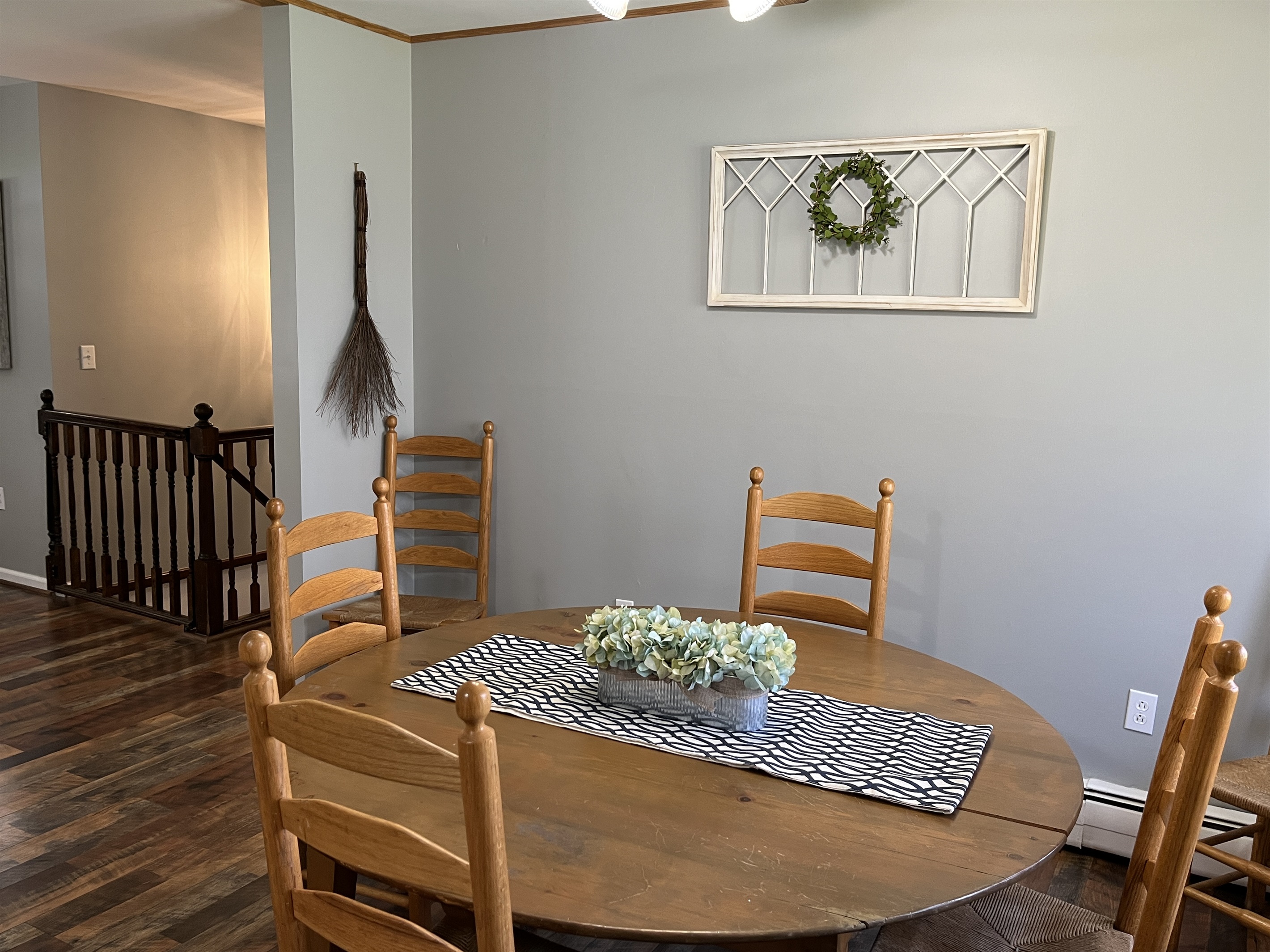Eat-in kitchen to living room (yes, that's a hinged baby gate)