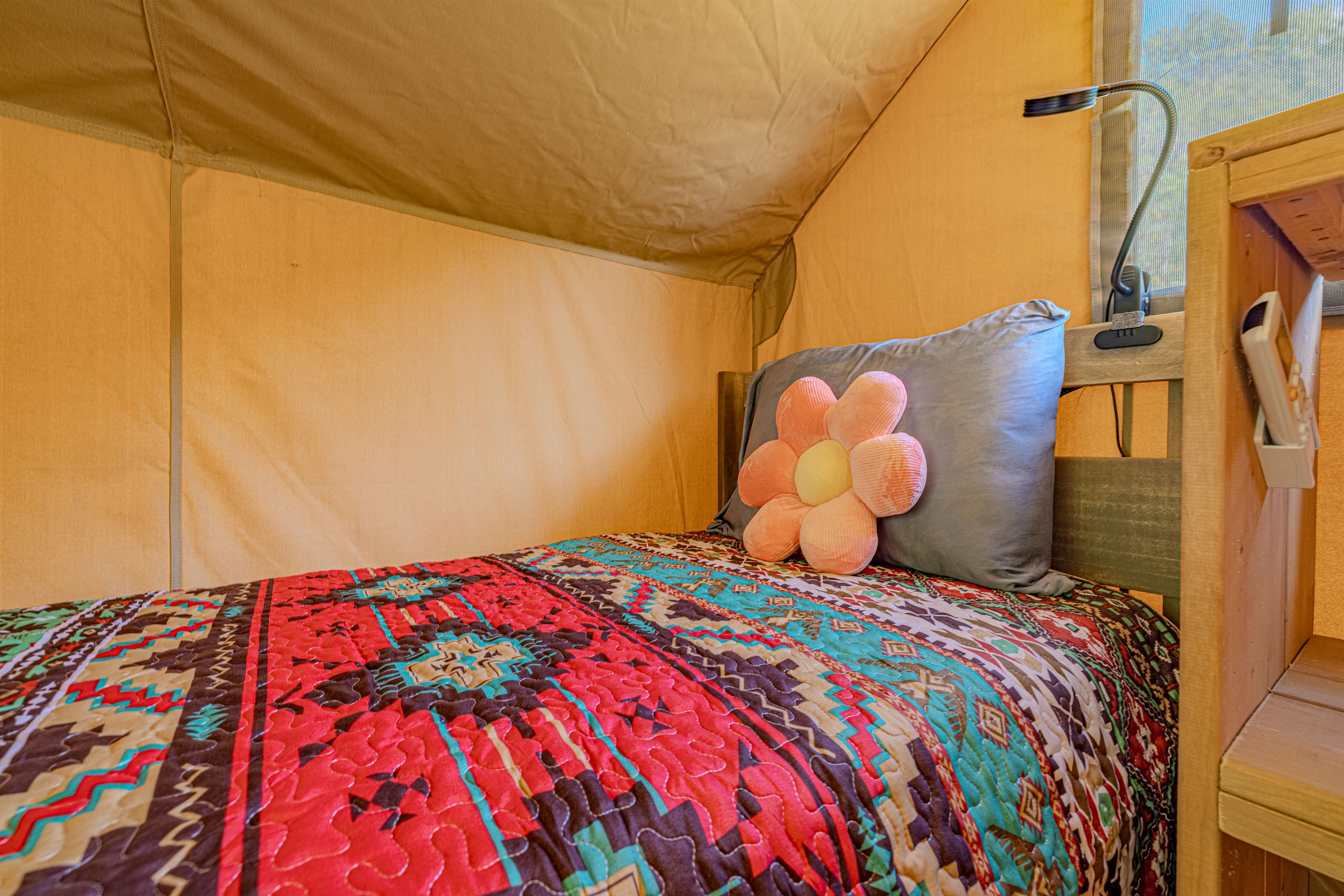 Rest easy after a day of adventure. This cozy, comfortable bed is waiting for you.