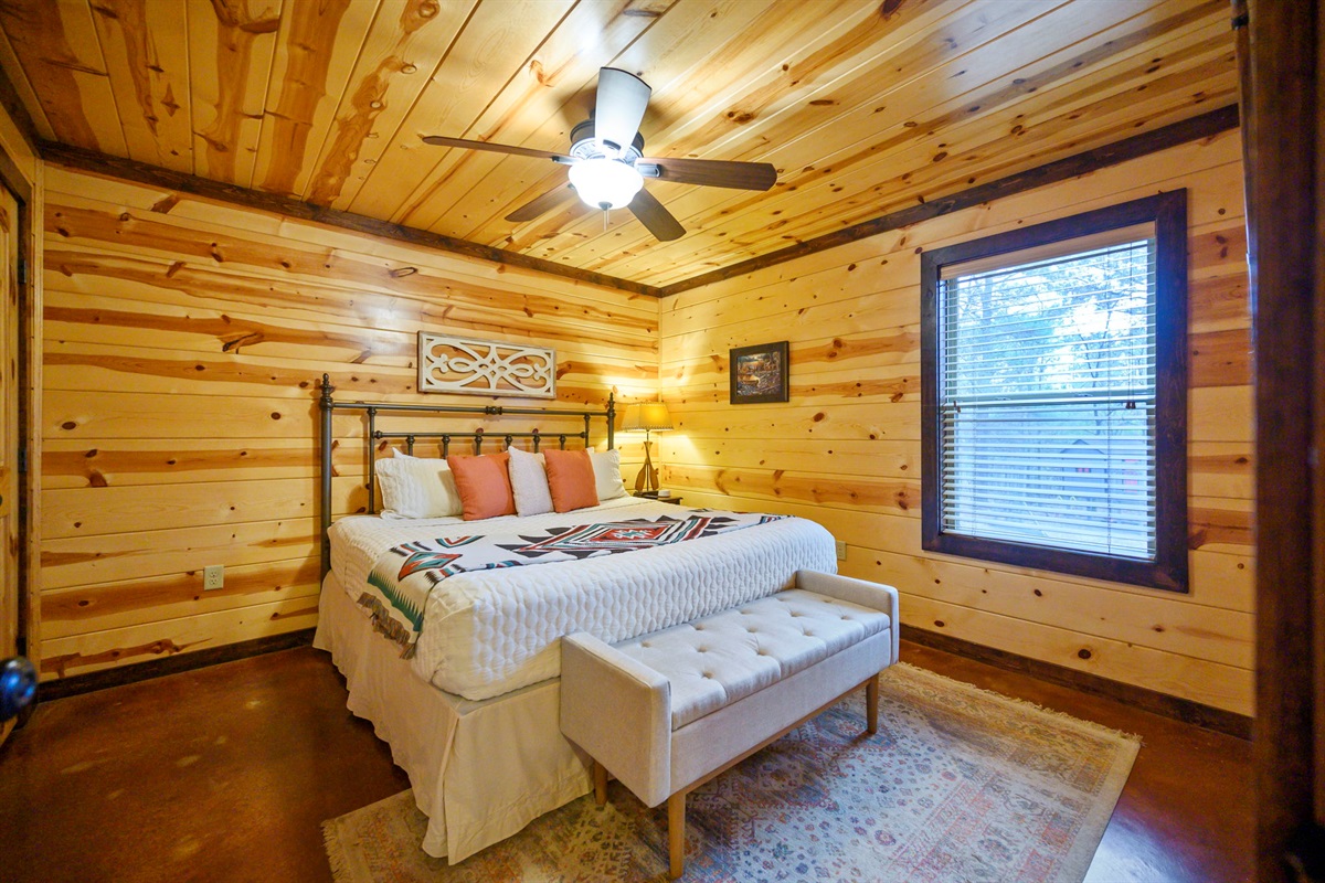 Bedroom #2 &ndash; King Bed: 🛏️ Cozy king suite wrapped in warm cabin charm