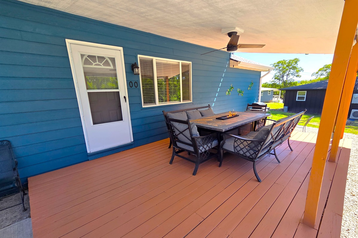 Enjoy sitting on the front deck and the ambiance when lighting the firepit built in the large dining table that seats 8 comfortably!