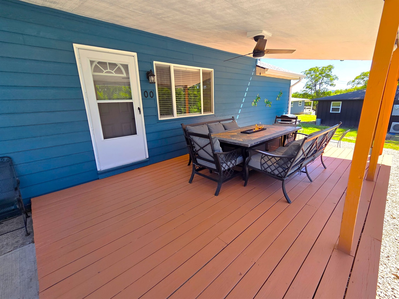Enjoy sitting on the front deck and the ambiance when lighting the firepit built in the large dining table that seats 8 comfortably!