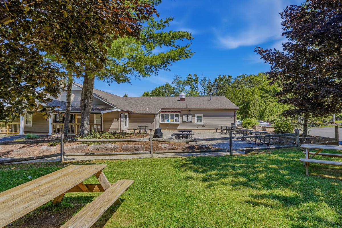 Community pavilion and recreation area with picnic seating
