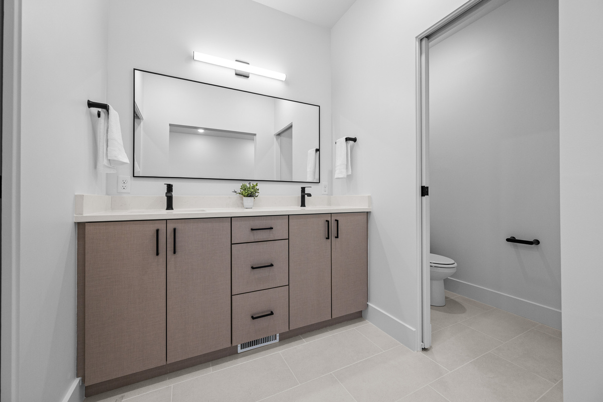 Spacious upstairs bathroom with double vanity.