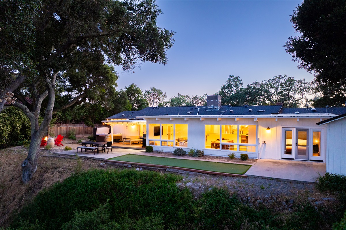 Perfect your putt or just enjoy the twilight in this spacious backyard.