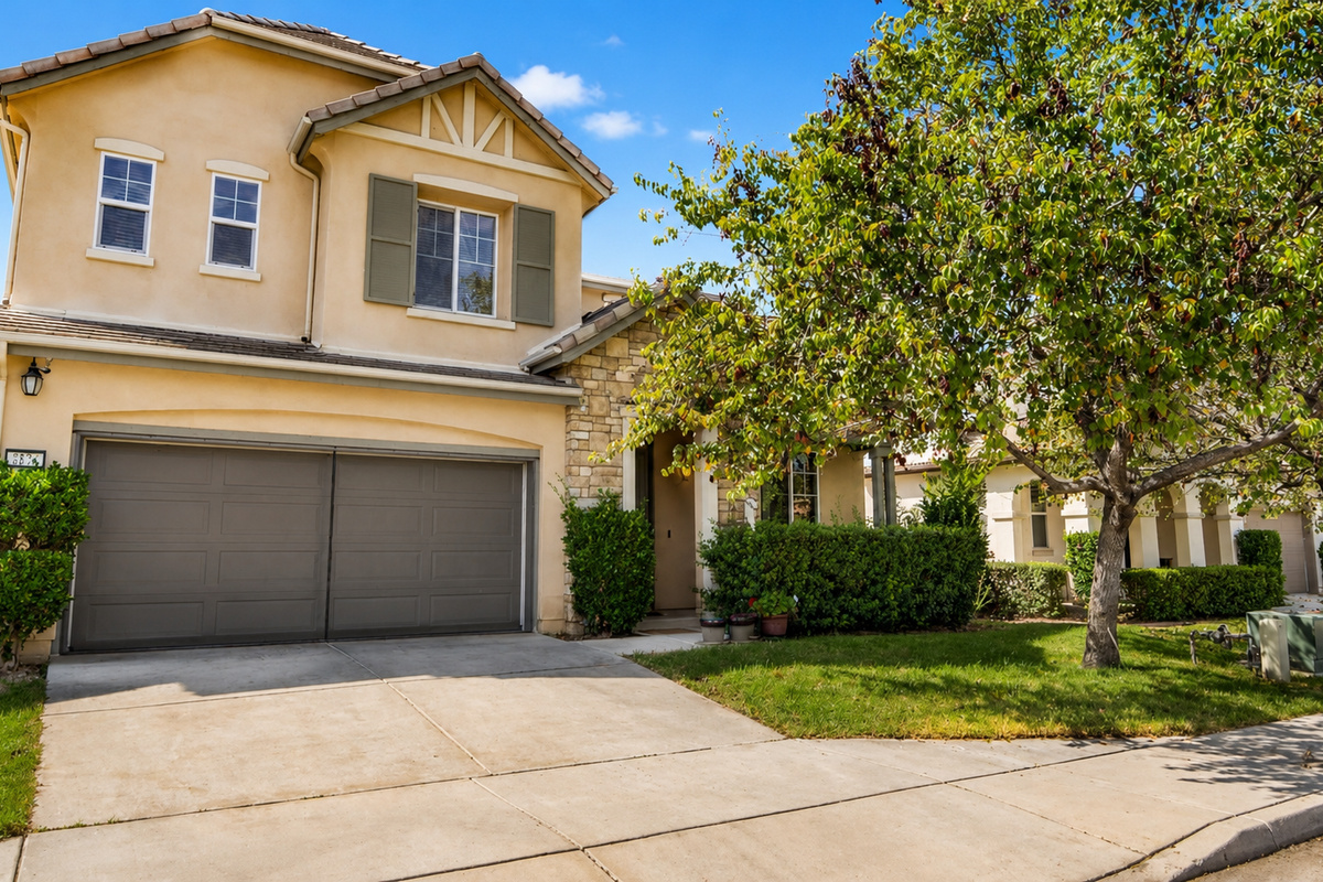 Front exterior with driveway parking. Please note that the property does not have garage access