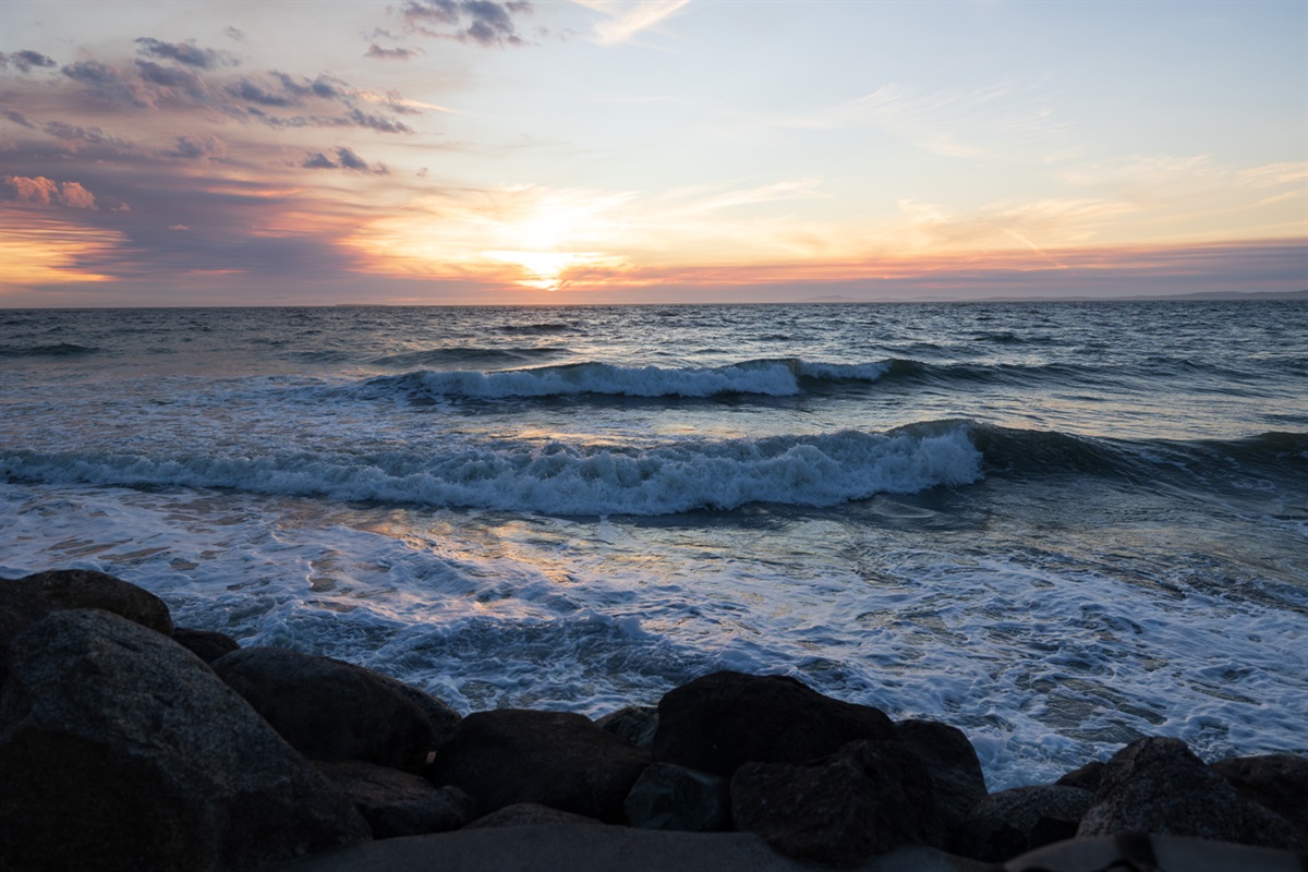 View of sunset and waves during high tides from the hot tub.
