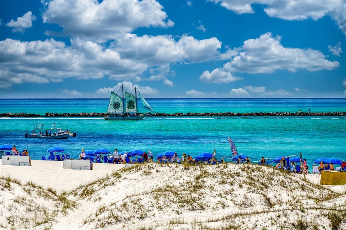 The beach outside this dune-front retreat is one of the most scenic stretches on the Emerald Coast. Sailboats and dolphins daily.