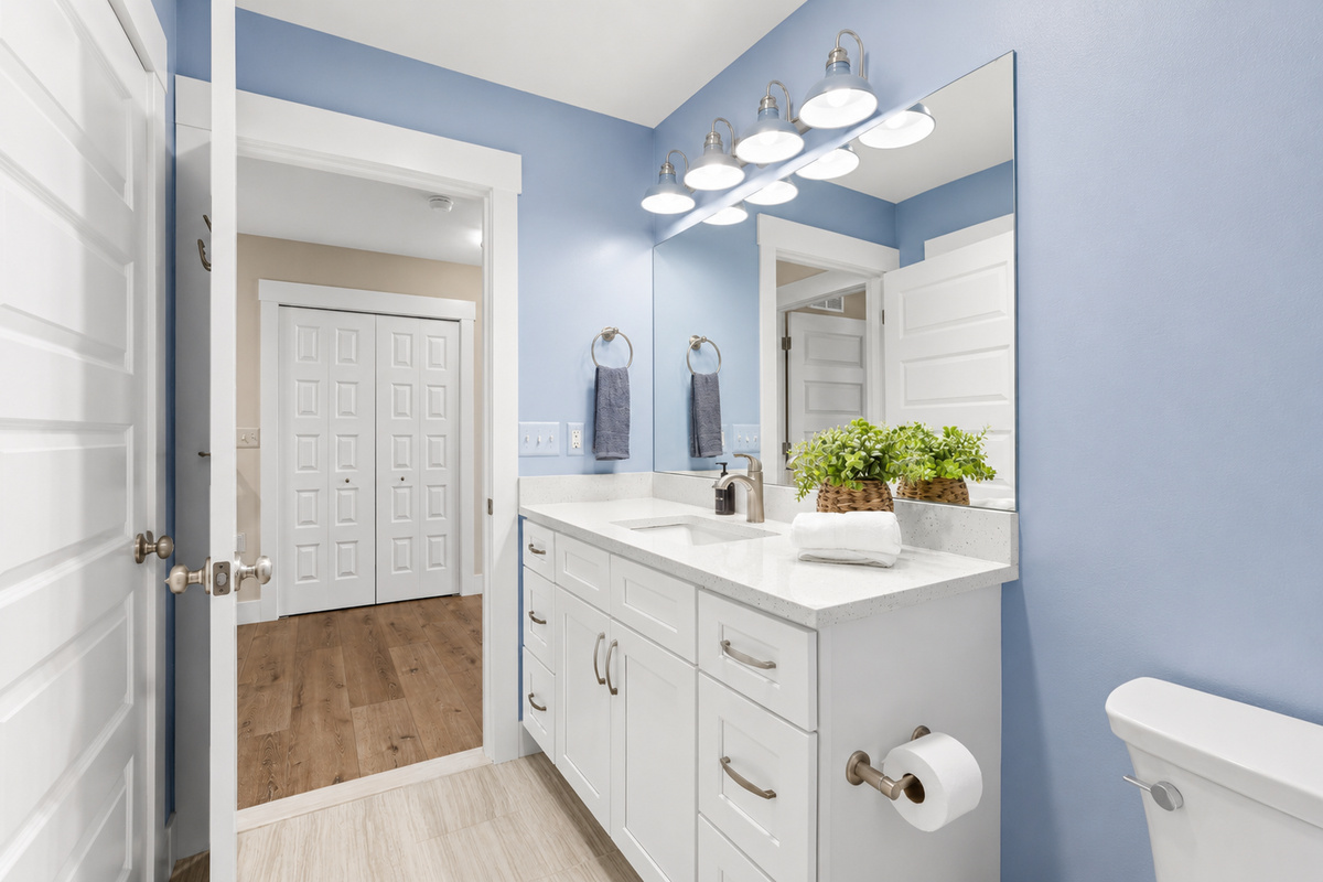 Conveniently located just steps from the third-floor bedroom, this full bathroom offers everything your family or group needs for a comfortable and relaxing stay.