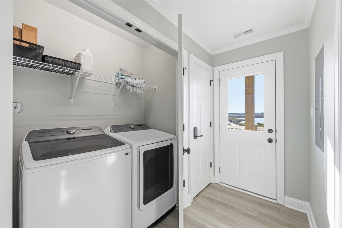 Convenient in-home laundry area with full-size washer and dryer, making extended stays easy and stress-free