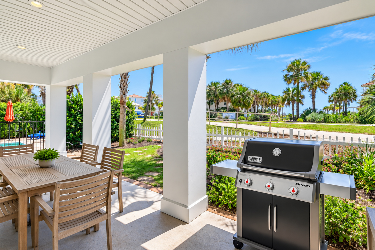 Relax and dine in your private outdoor space, surrounded by lush palms and beautiful 30A scenery. Enjoy easy outdoor entertaining with a spacious dining area and grill.