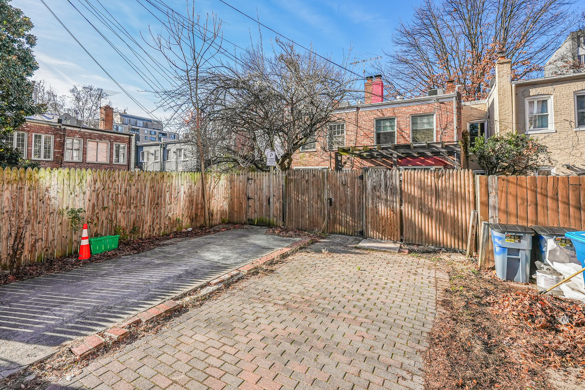 Rear Parking Space, Back of House (21’ long x 10’ wide).