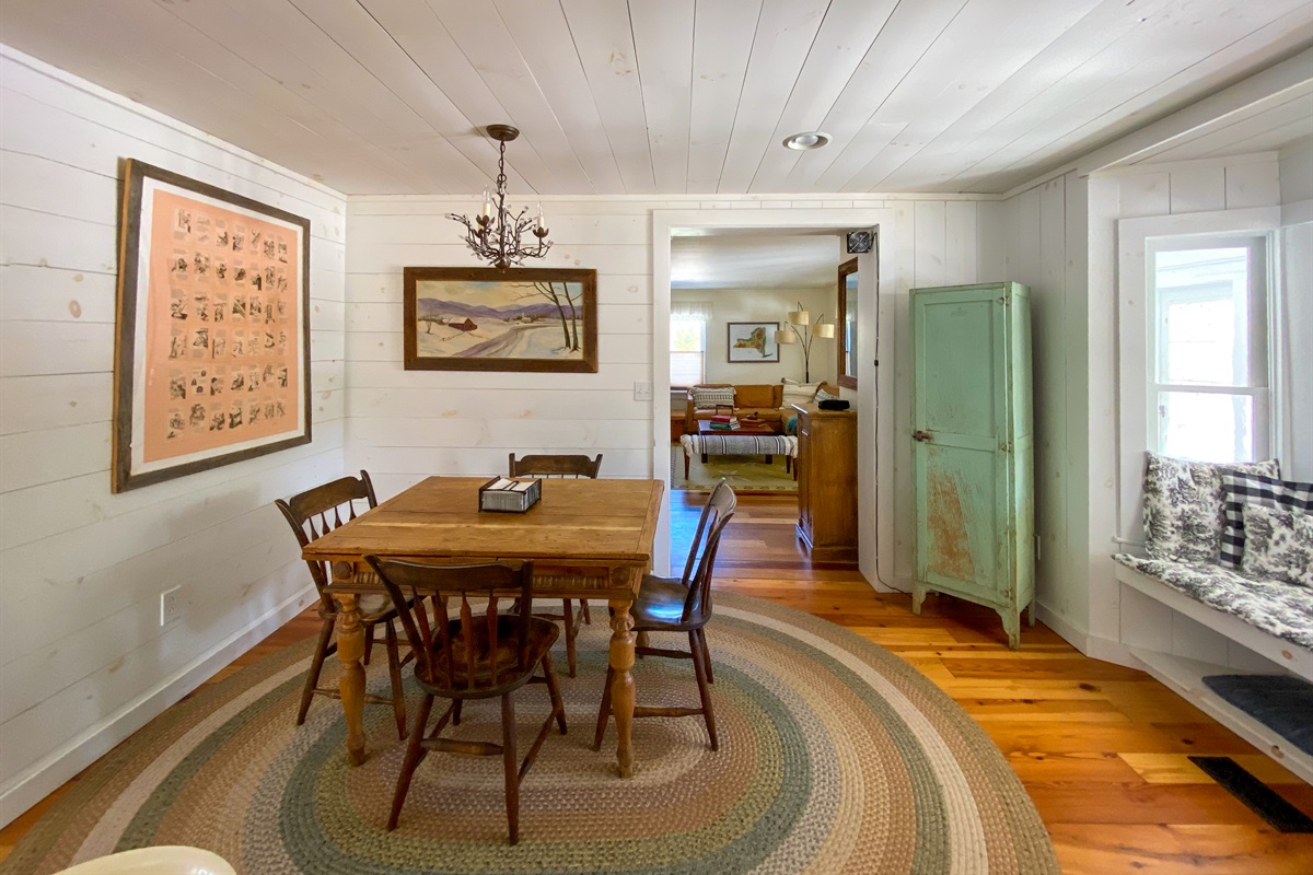 The dining table right off the kitchen expands to feed your group of six, or play games, or just sit and relax.