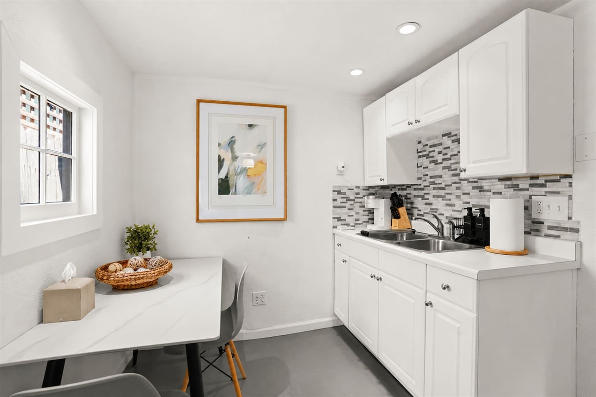 Convenient kitchenette with coffee station and essentials for easy mornings and light meals.