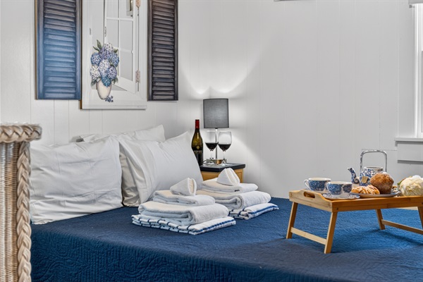 A cozy retreat centered around a full-size bed for everyday relaxation.