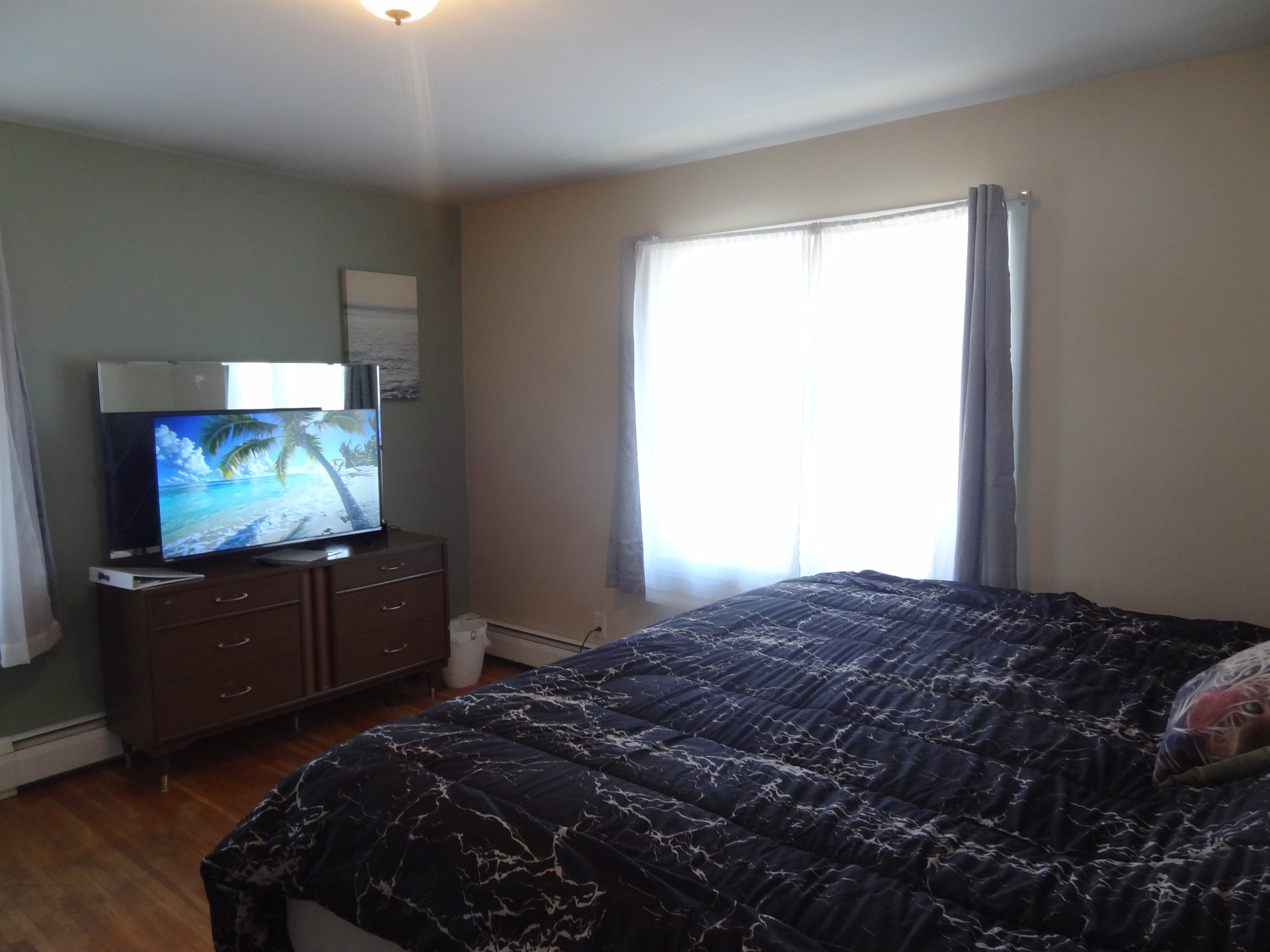 King bed with Roku smart TV