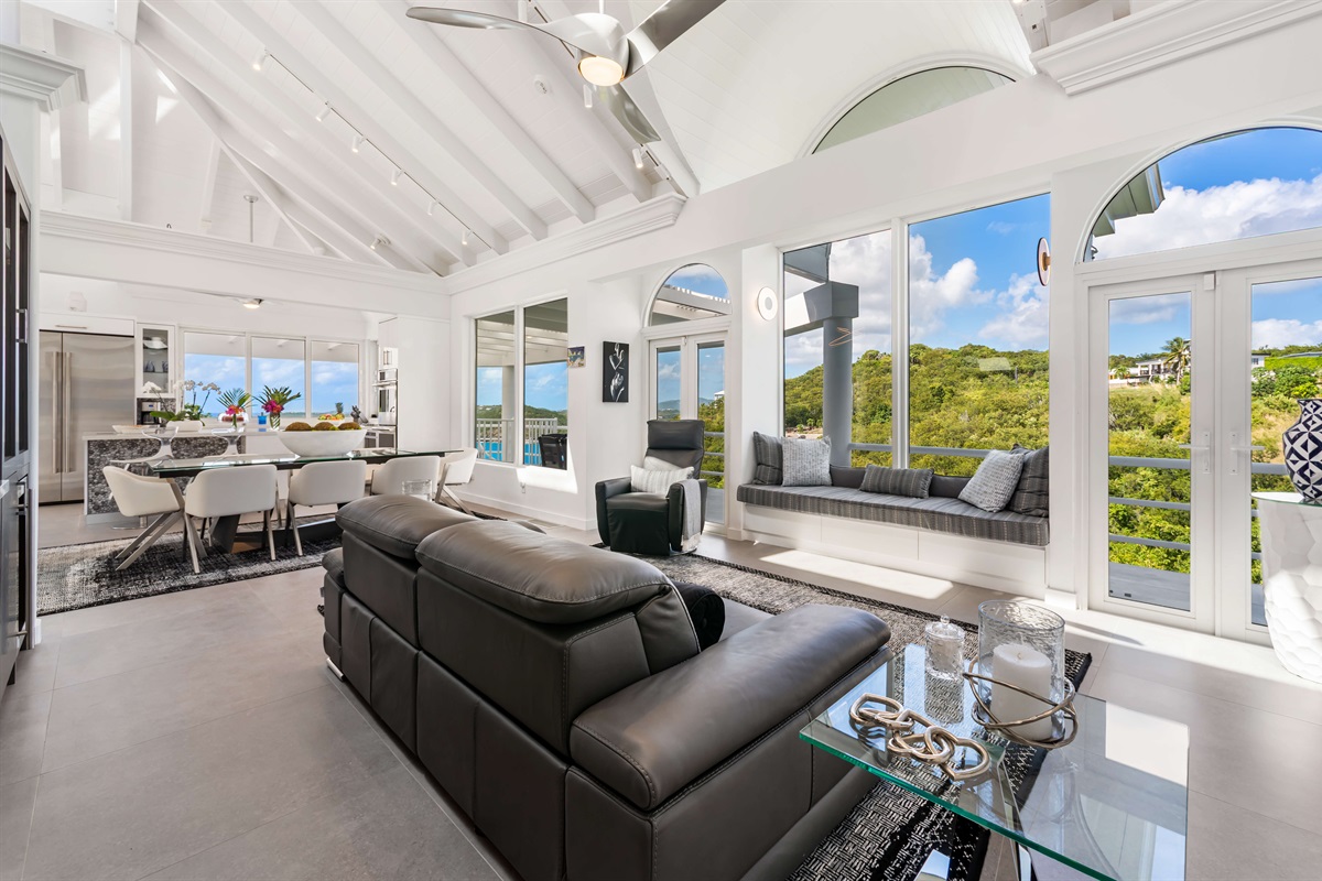 Large open living room and dining room with gorgeous views