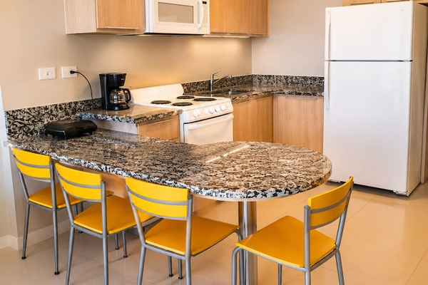 Enjoy your meals at a spacious dining area, perfect for gatherings or quiet dining.