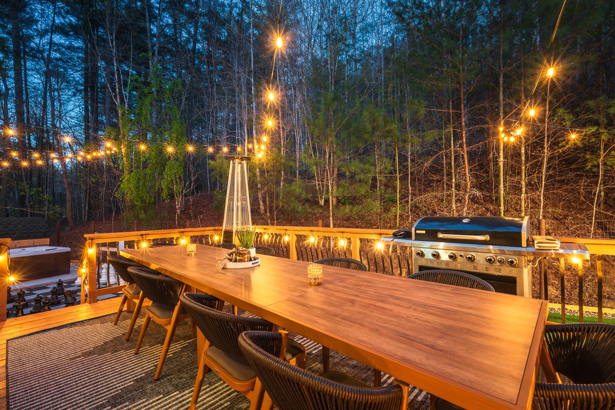 Expansive outdoor dining area under string lights - perfect for group dinners after visiting Asheville’s food scene