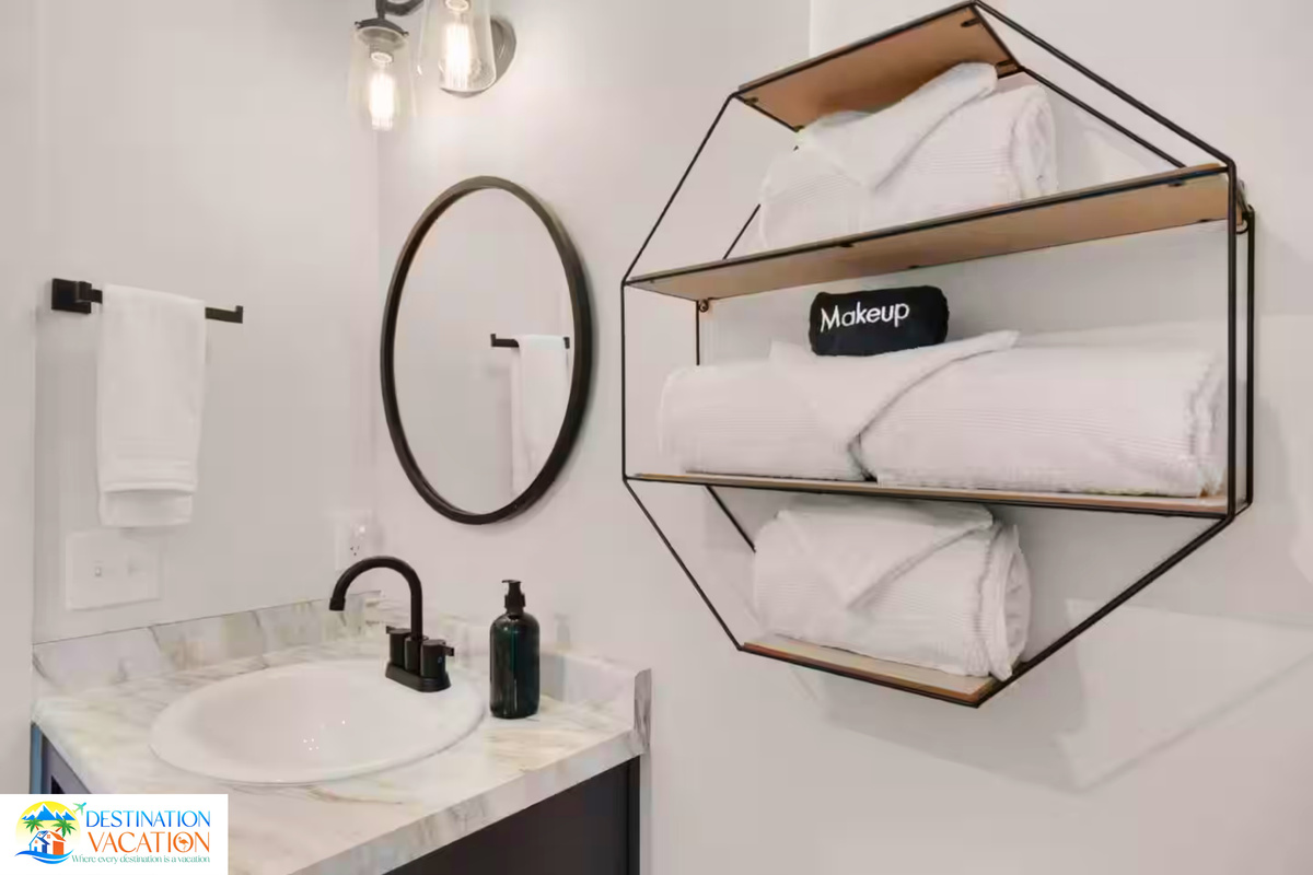 Modern fixtures add polished comfort to this bright bathroom.