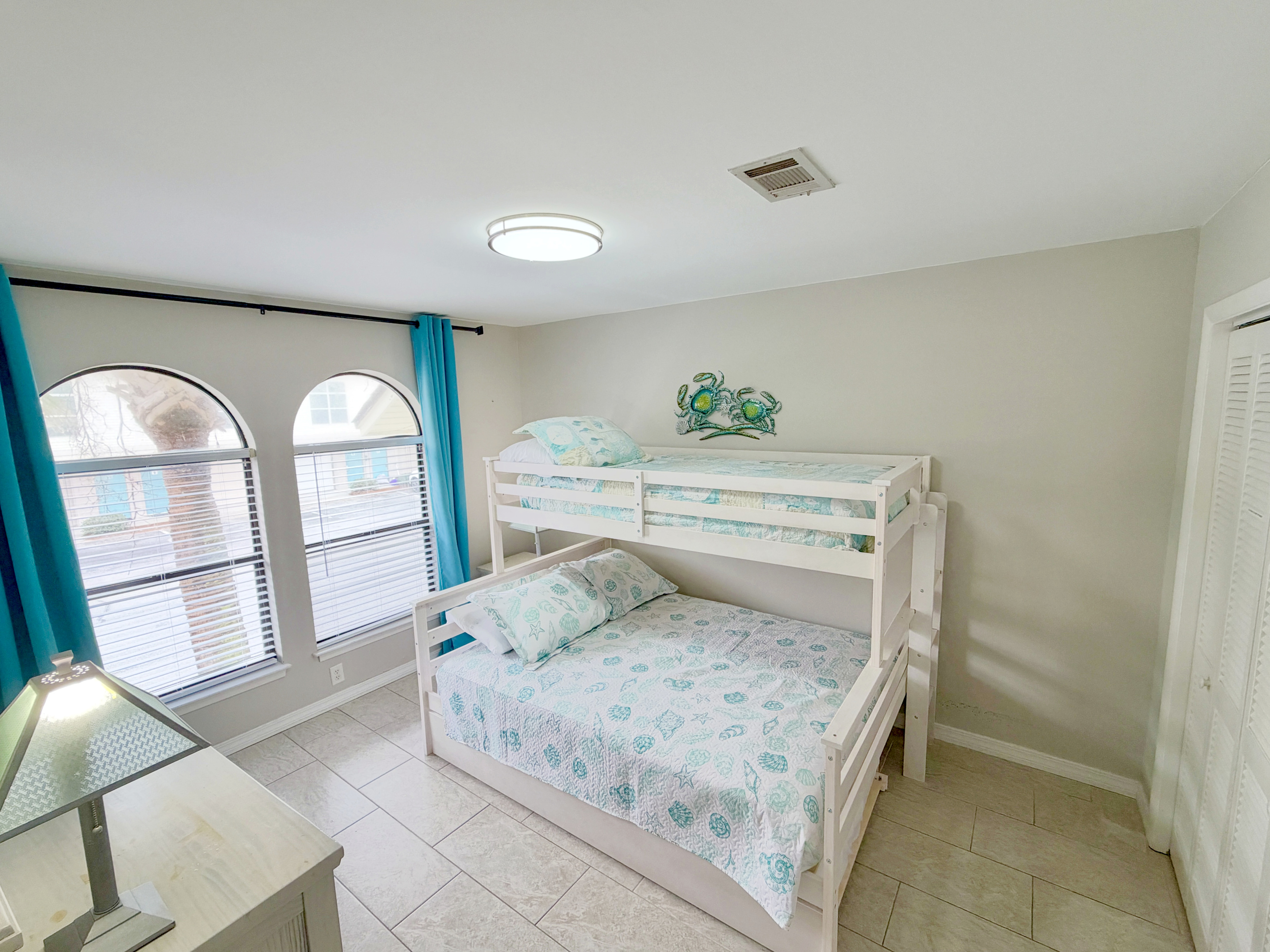 Secondary bedroom with queen/twin bunk bed. There is an additional trundle bed also.
