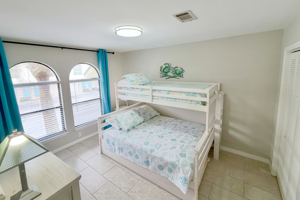 Secondary bedroom with queen/twin bunk bed. There is an additional trundle bed also.
