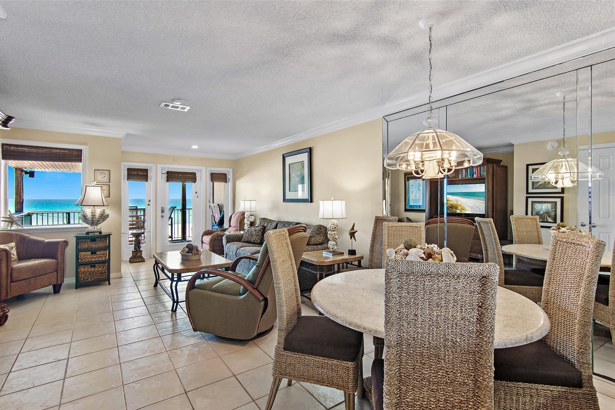 2nd Floor has the Primary Living Space with a comfortable, Gulf View living room with tons of seating around a 55" Smart TV!