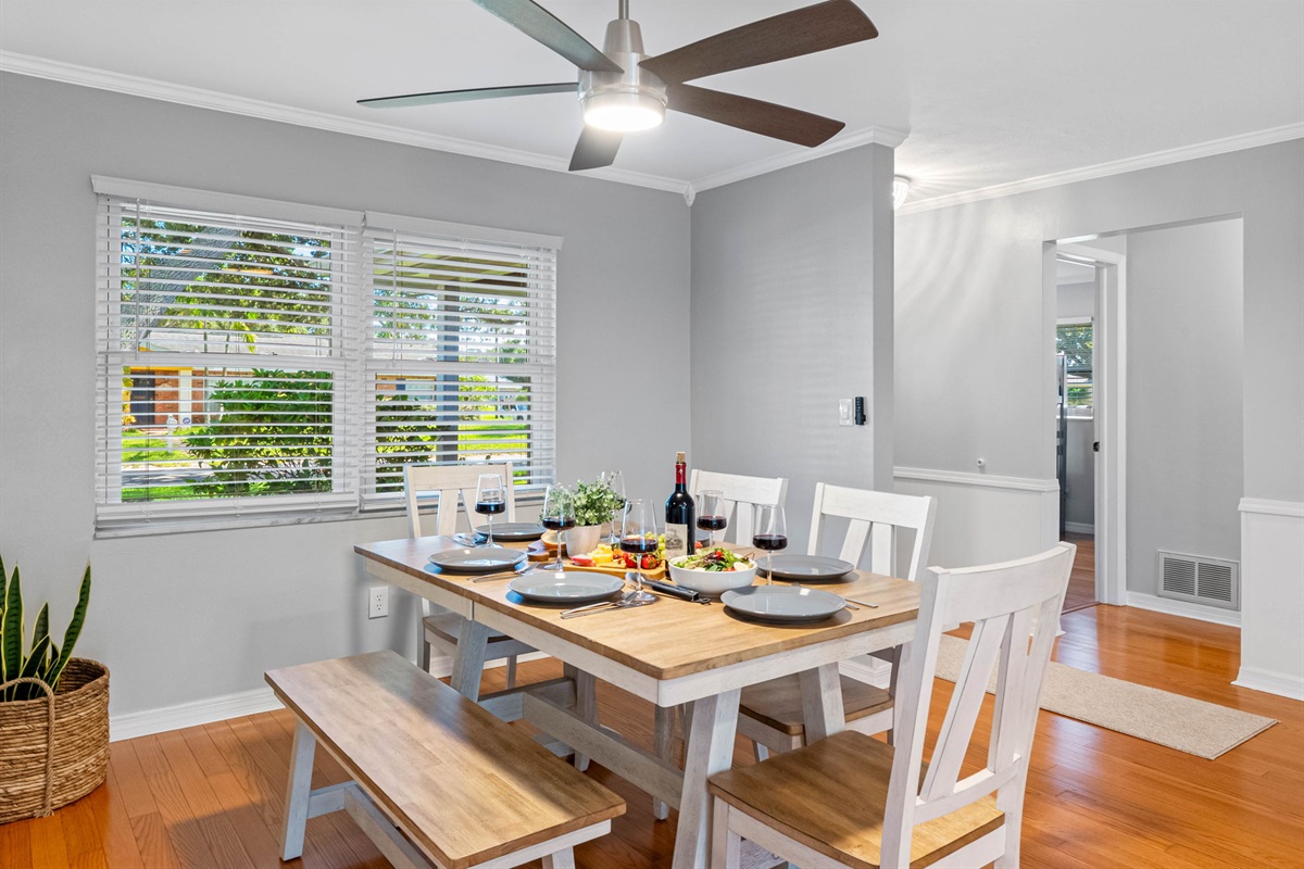 Open-concept charm—this dining space keeps everyone connected whether you're cooking, lounging, or eating.