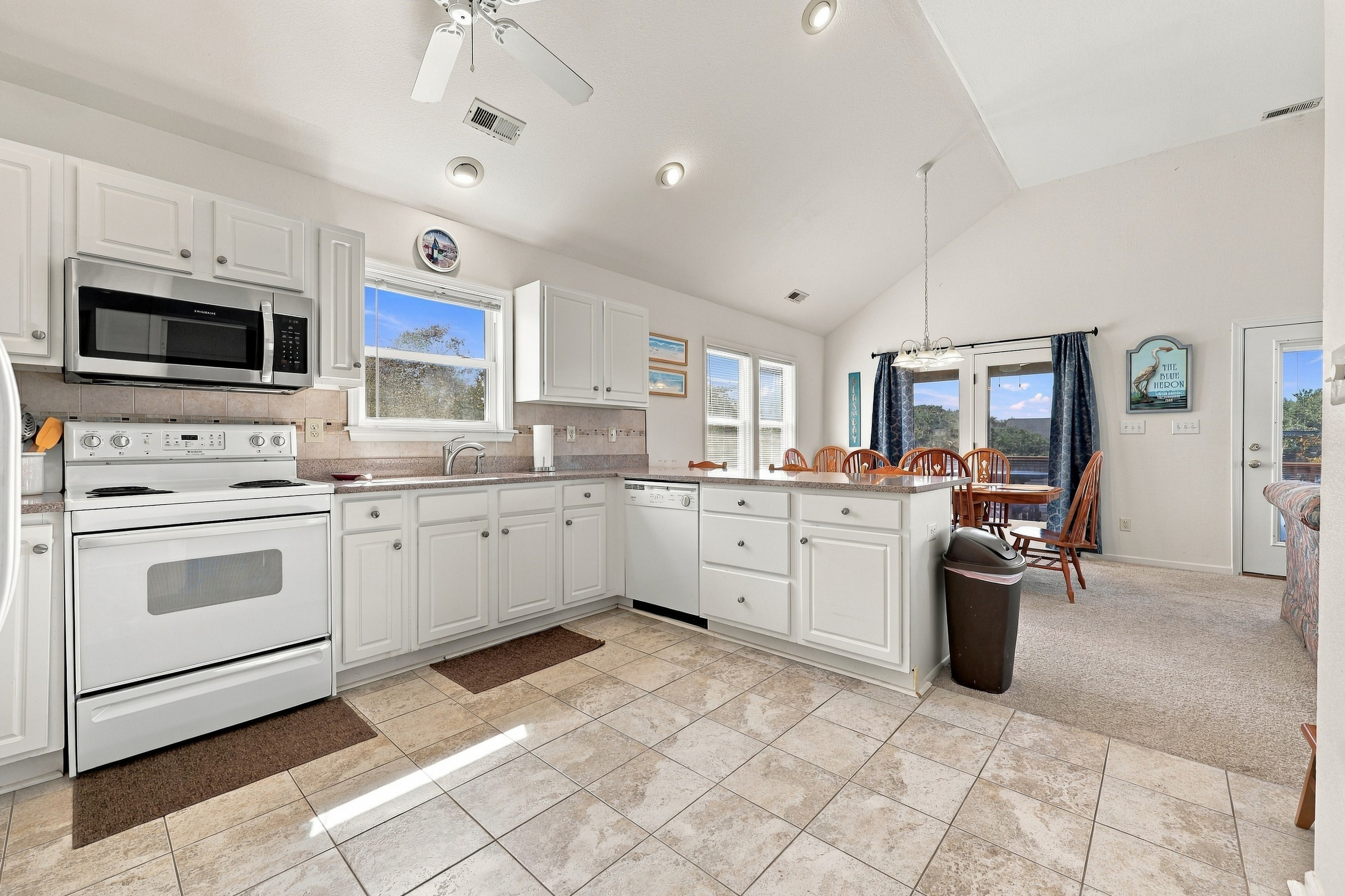 Lots of counter space, a dishwasher and a sunny window over the sink.