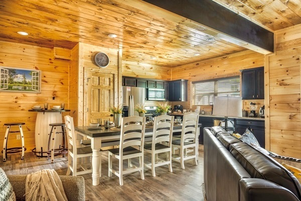 Experience the epitome of culinary convenience in our kitchen, equipped with a spacious range, versatile coffee maker, and exquisite decor, making it a haven for food enthusiasts.