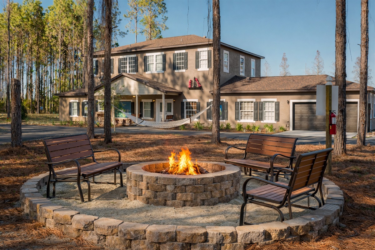 Fire pit gathering area at Clermont lakefront estate