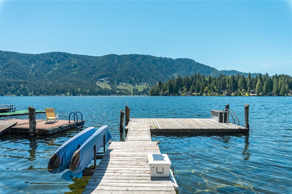Dock with two stand up paddle boards available for your use.