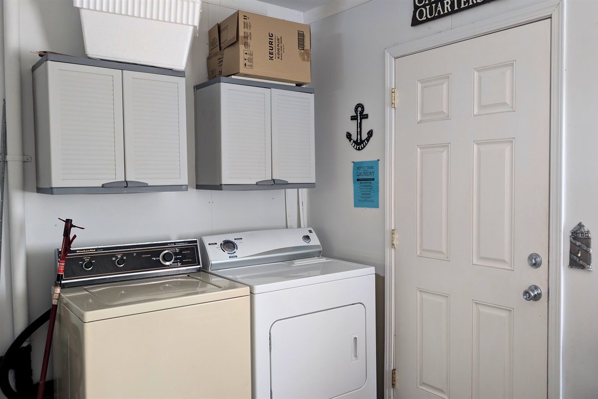 Laundry in Garage - door to back yard/deck